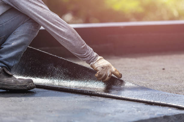 Professional Waterproofing technician working in Andover, KS
